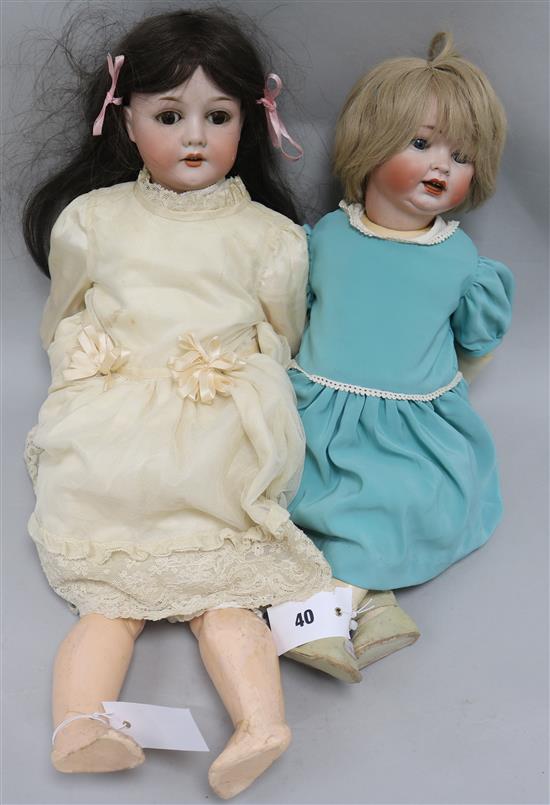 A Hertel & Schwab bisque doll Germany 152/10 and a C M Bergmann Wallershausen Germany 1916 6 doll
